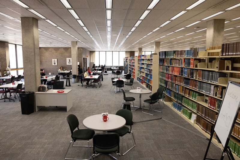 HSAC study space showing tables and chairs in library