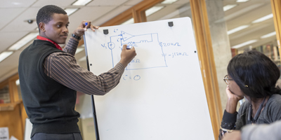 NIU student providing help with coursework.